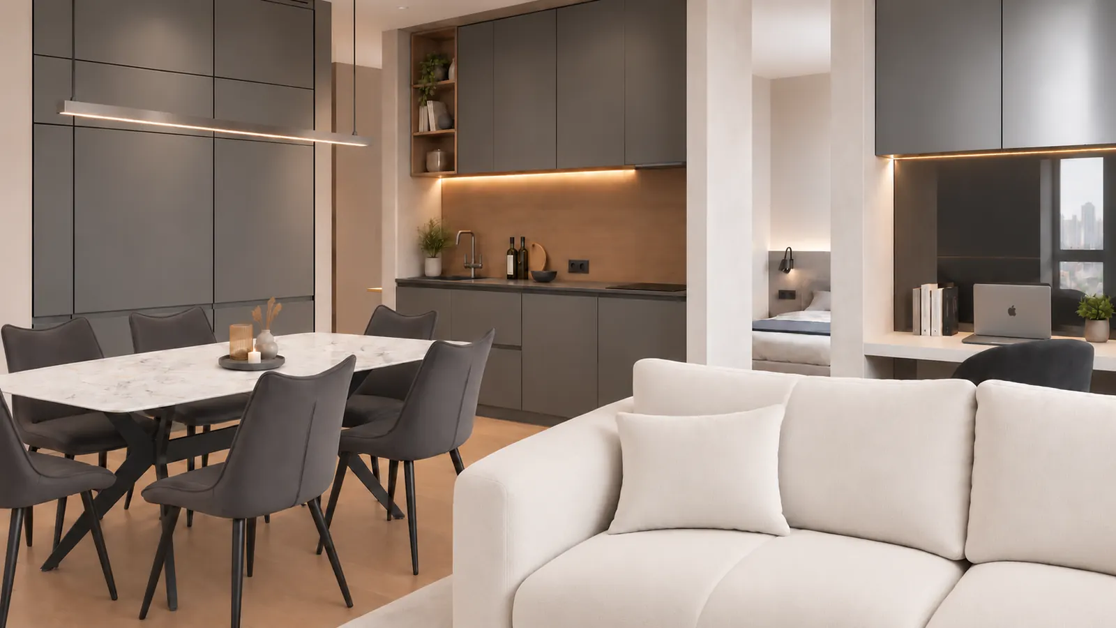 Open-plan apartment with ivory sofa, marble dining table and graphite kitchen cabinetry